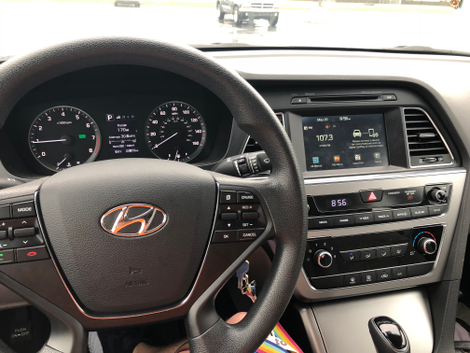 Driver oriented center console with lots of buttons is easy to use and pleasant to view